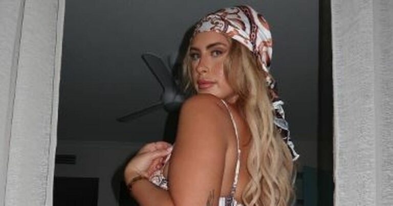 Curvy-babe-told-shes-wearing-wrong-size-as-teeny-bikini-flashes-underboob.jpg