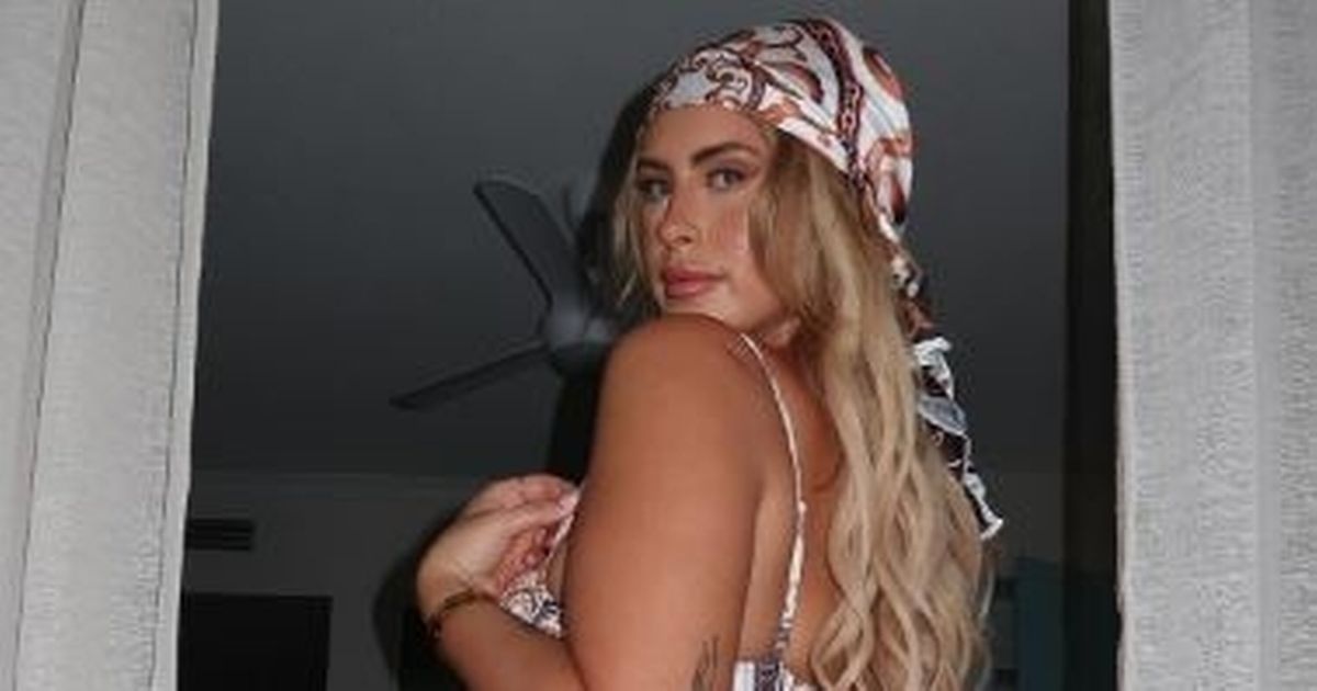 Curvy-babe-told-shes-wearing-wrong-size-as-teeny-bikini-flashes-underboob.jpg