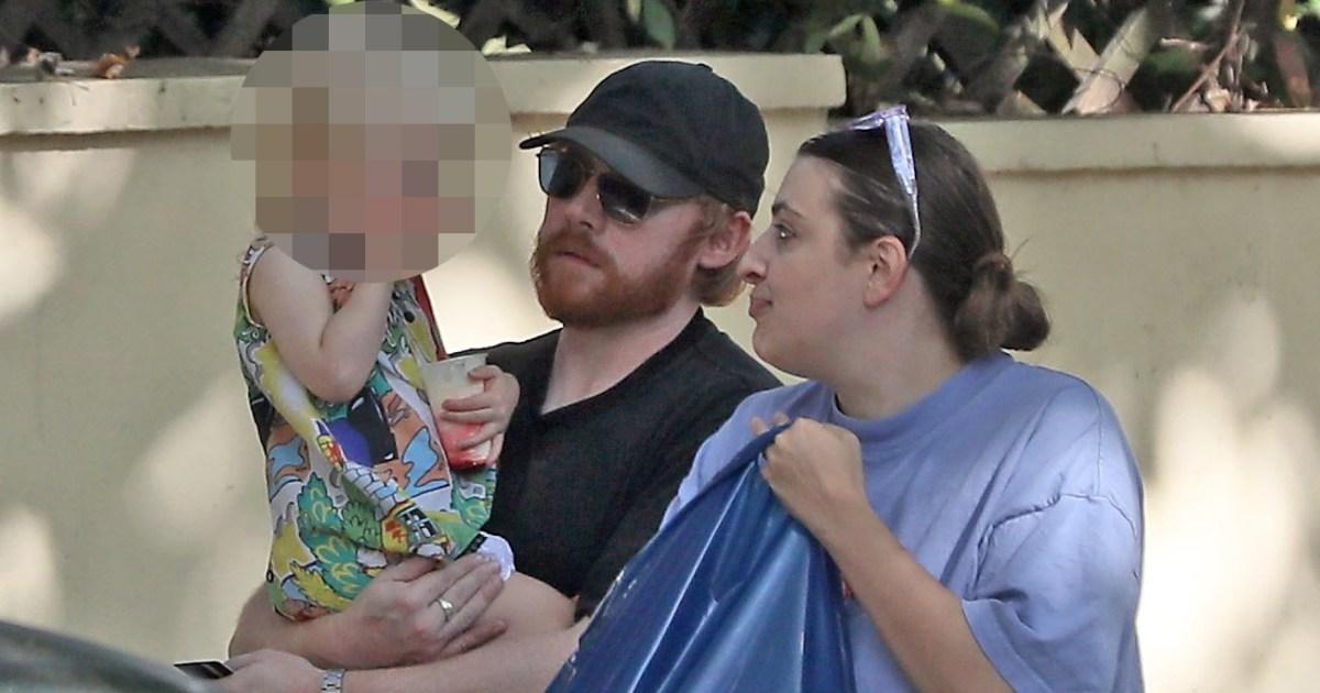 Rupert-Grint-scoops-up-daughter-Wednesday-3-and-carries-her-to-toy-shop.jpg