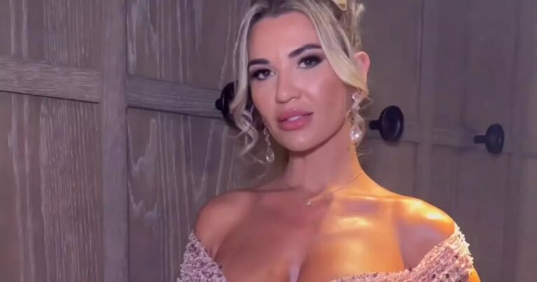 Christine-McGuinness-bares-her-curves-in-racy-wide-open-dress-as-fans-go-wild.jpg