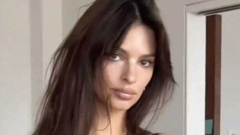 Emily-Ratajkowski-shows-off-her-long-legs-in-very-tiny-red-silk-babydoll-dress-inside-her-messy-room-filled-with-shoes-The-Sun.jpg
