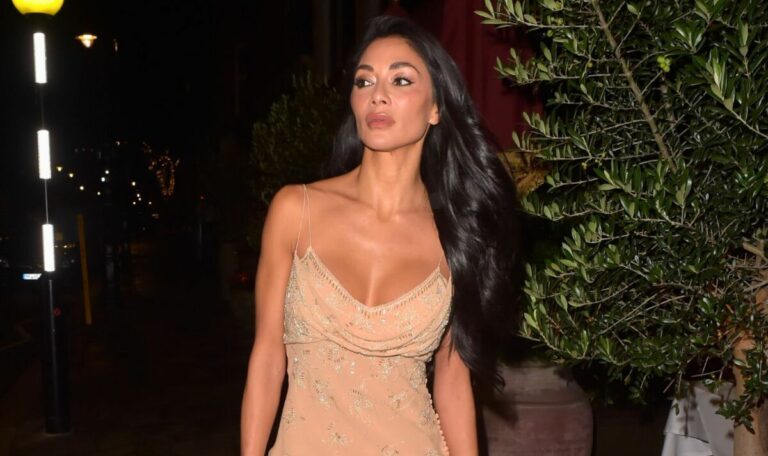 Nicole-Scherzinger-flaunts-cleavage-in-figure-hugging-nude-dress.jpg