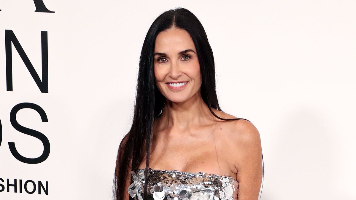 Demi-Moore-dons-strapless-silver-sequin-dress-at-CFDA-Fashion-Awards.jpg