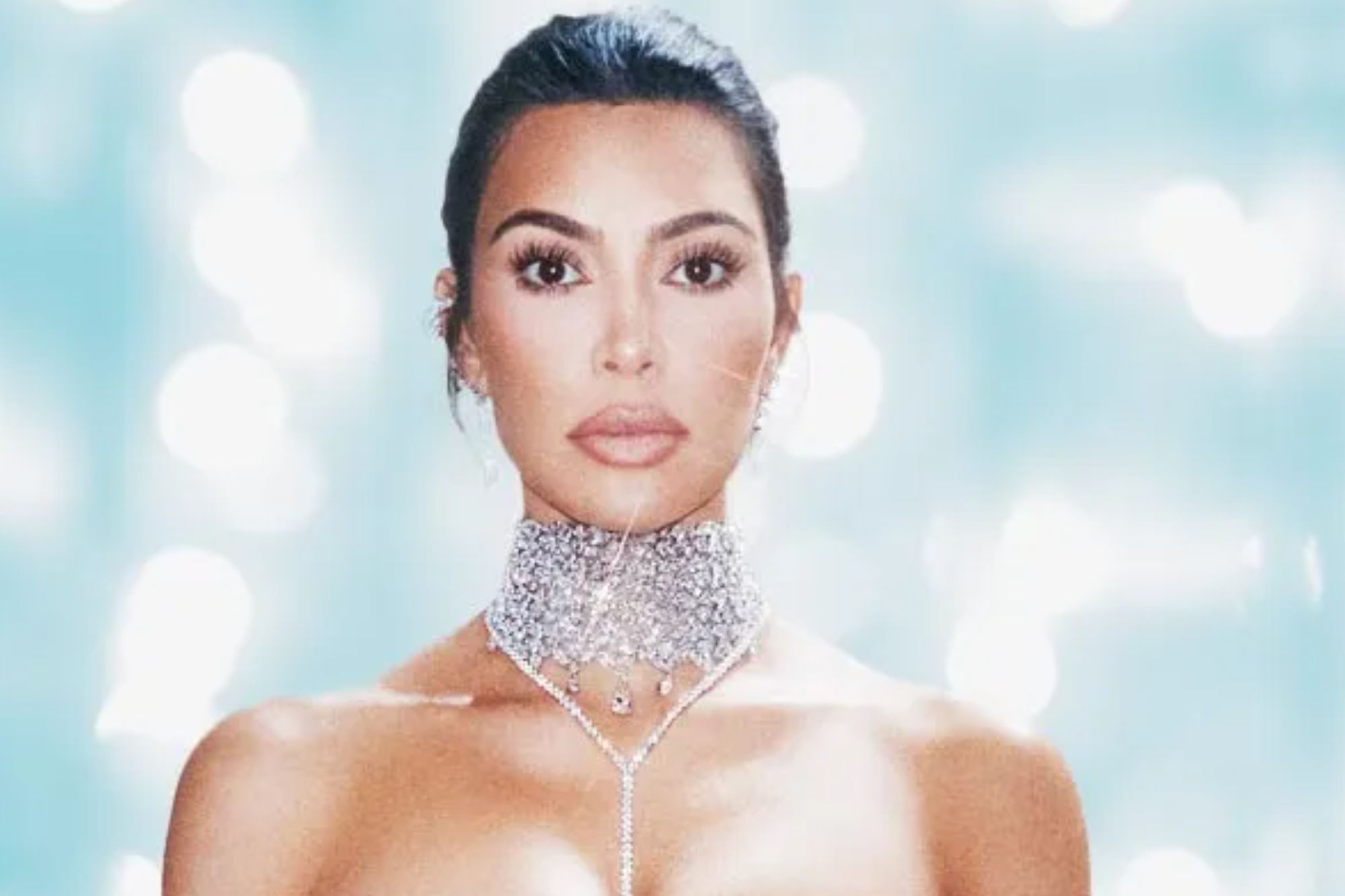 Kim-Kardashian-43-shows-off-her-curves-in-bejewelled-nude-boob-tube-and-trousers-from-her-Skims-range-The-Sun.jpg