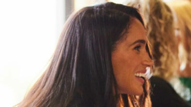 Meghan-Markle-opts-for-1490-Poppy-cardigan-to-meet-veterans.jpg