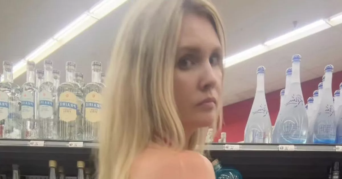 Mormon-mum-wears-extreme-cut-out-dress-as-she-goes-shopping-for-a-man.jpg