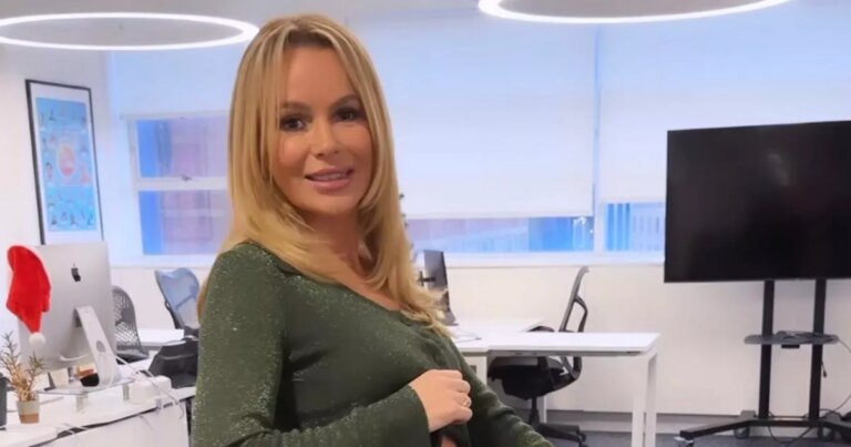 Amanda-Holden-flashes-torso-and-nearly-exposes-knickers-tugging-loose-trousers.jpg
