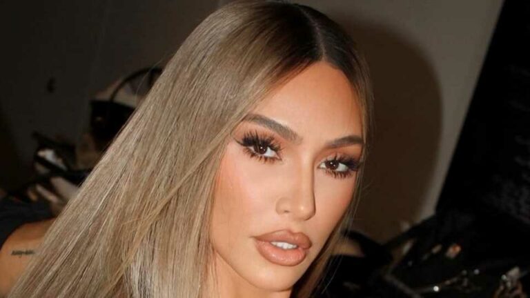 Kim-Kardashian-climbs-into-skintight-brown-dress-in-bathroom-for-backstage-photos-before-red-carpet-in-LA-The-Sun.jpg
